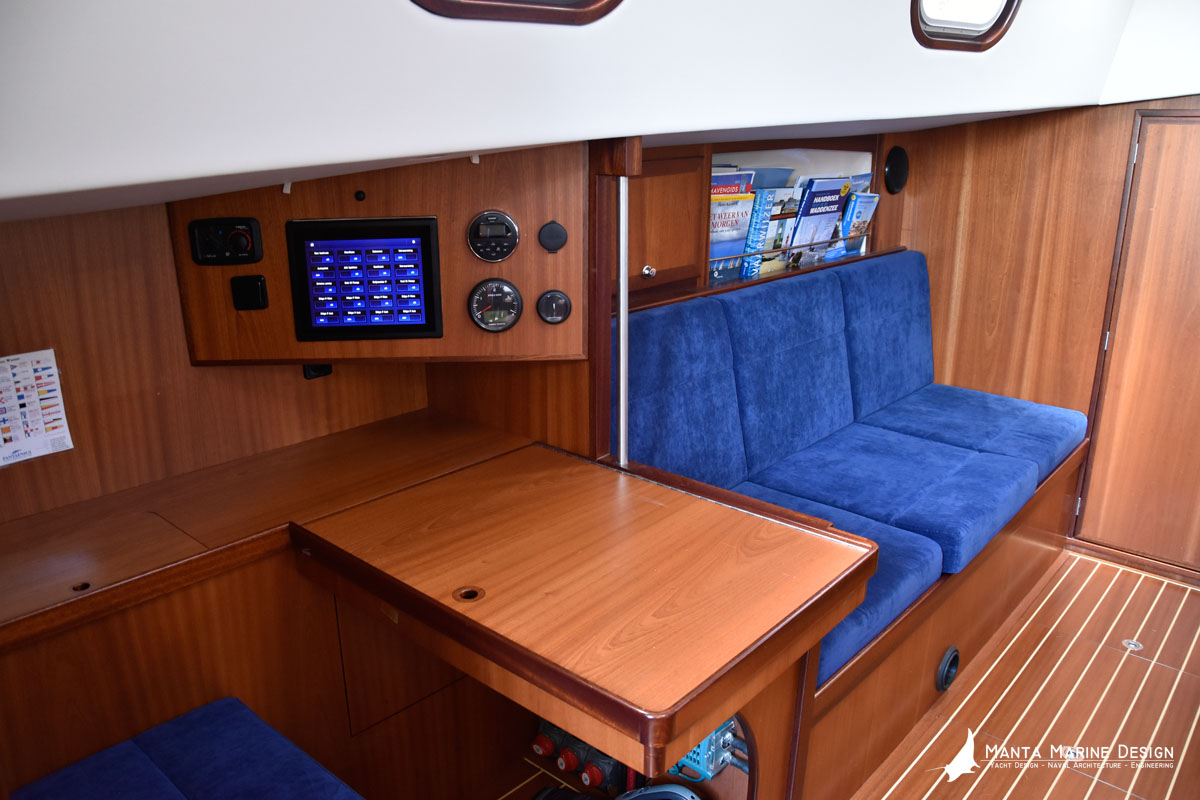 Bornrif 33SC shallow draft steel sailing yacht with centerboard - interior portside with navigation station